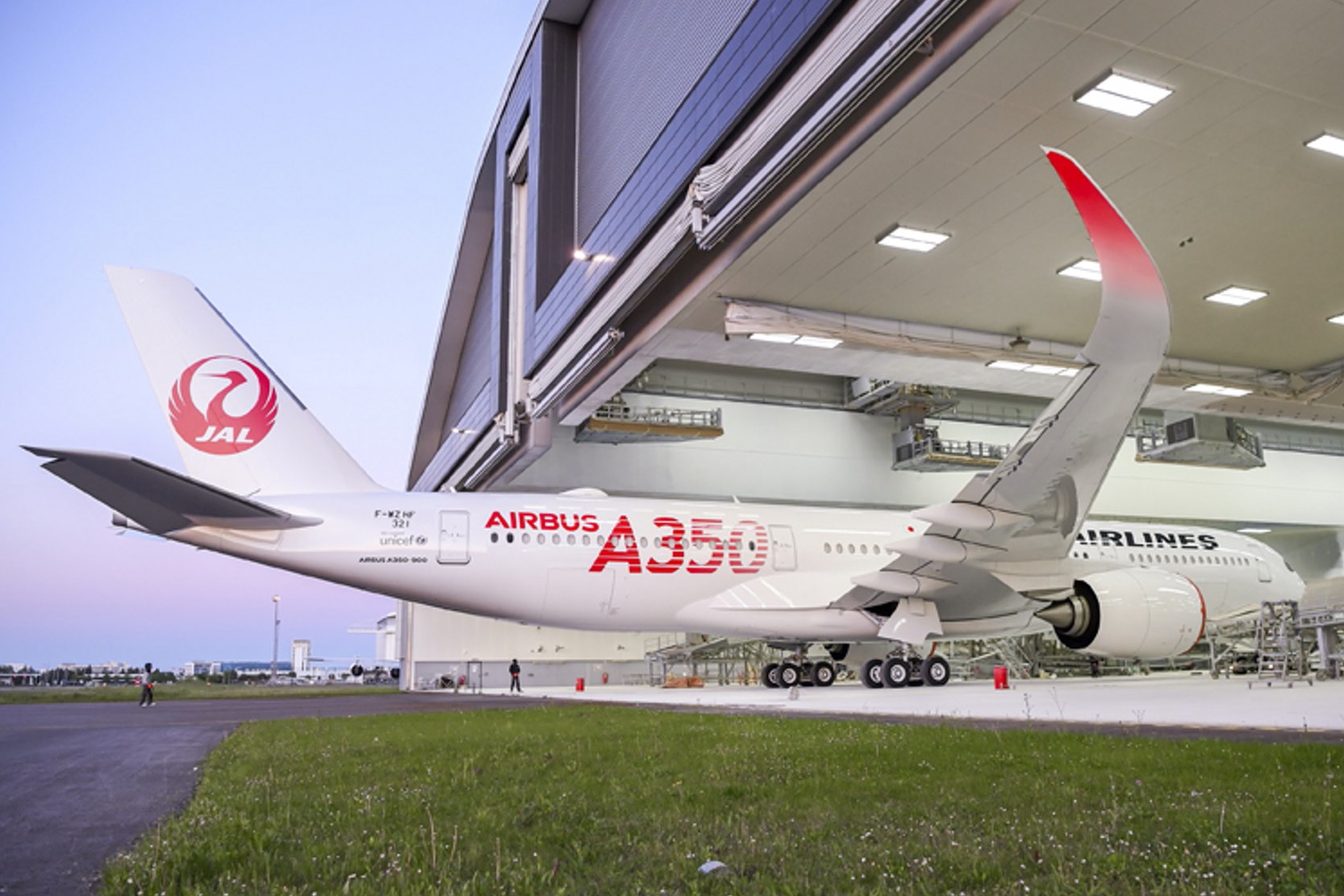 First JAL A350-900 rolls out of Airbus paint shop - Japan Today