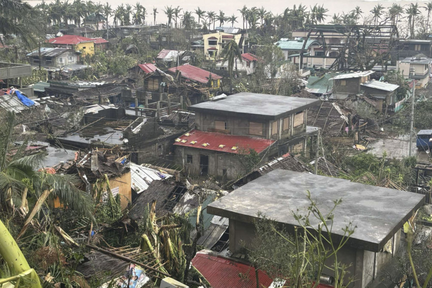 Typhoon batters Philippines, causing tidal surges and displacing about