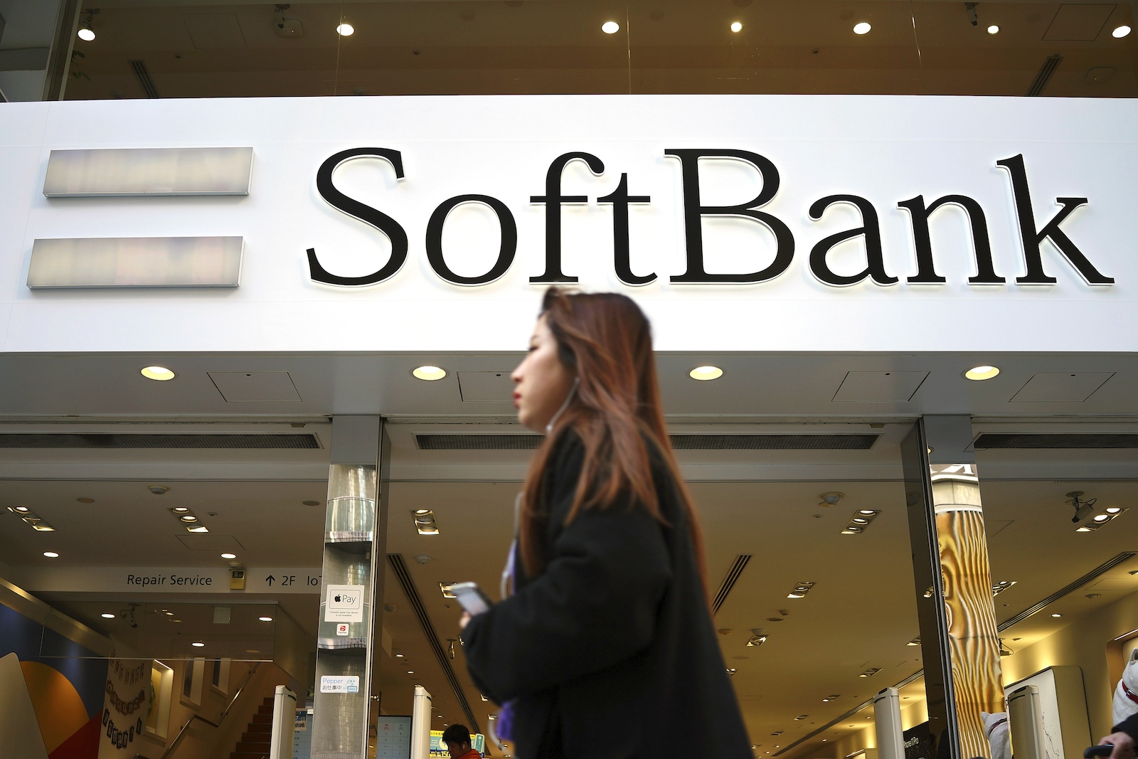 SoftBank reports 3rd-quarter loss weeks after announcing AI investment with Trump