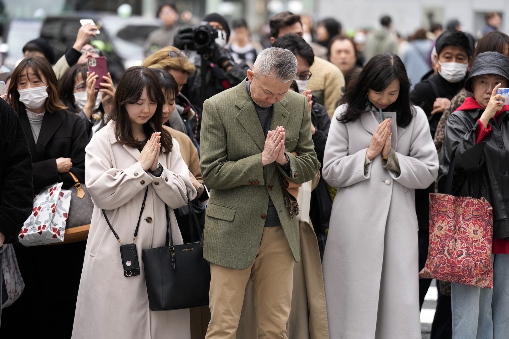 Japan marks 14th anniversary of quake, tsunami, nuclear disaster