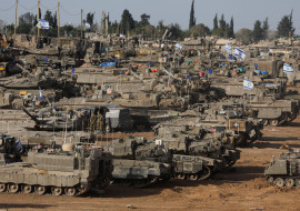 Israeli military vehicles are seen near the Israel-Gaza Border